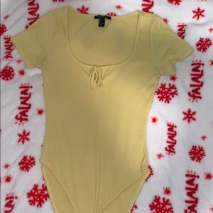 Yellow bodysuit